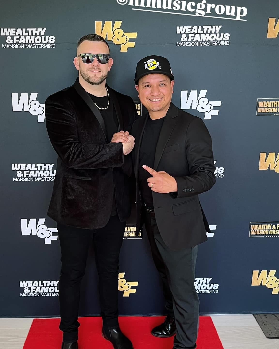 The DJ in a The DJ cap on the red carpet at an industry event